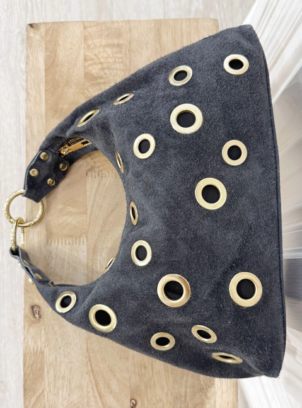 Bolso piel ante agujeros