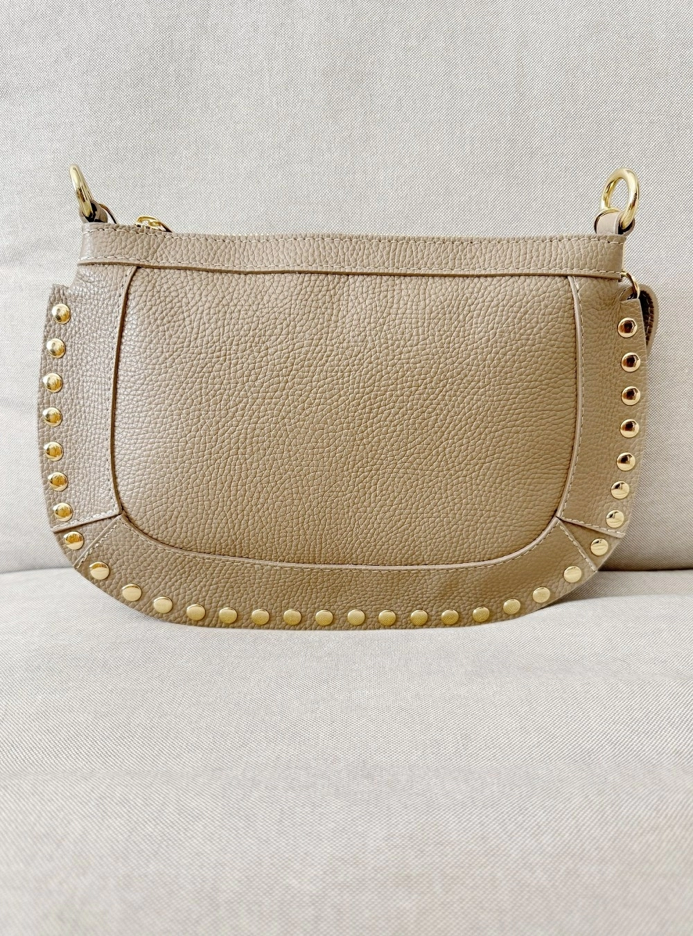 Bolso piel ovalado tachas Bolso piel ovalado tachas