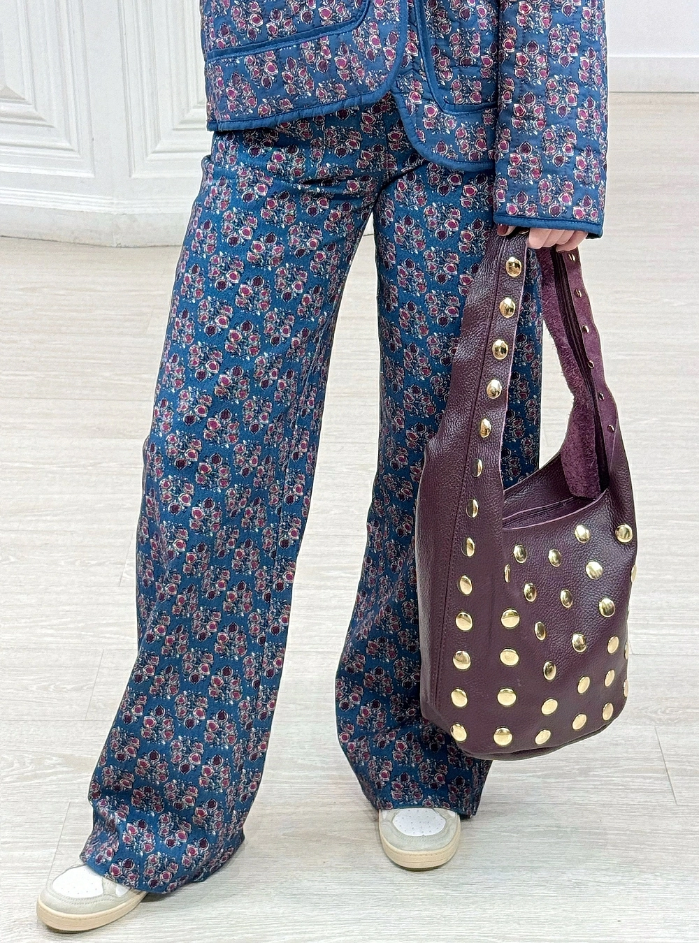 Bolso piel tachas frontal