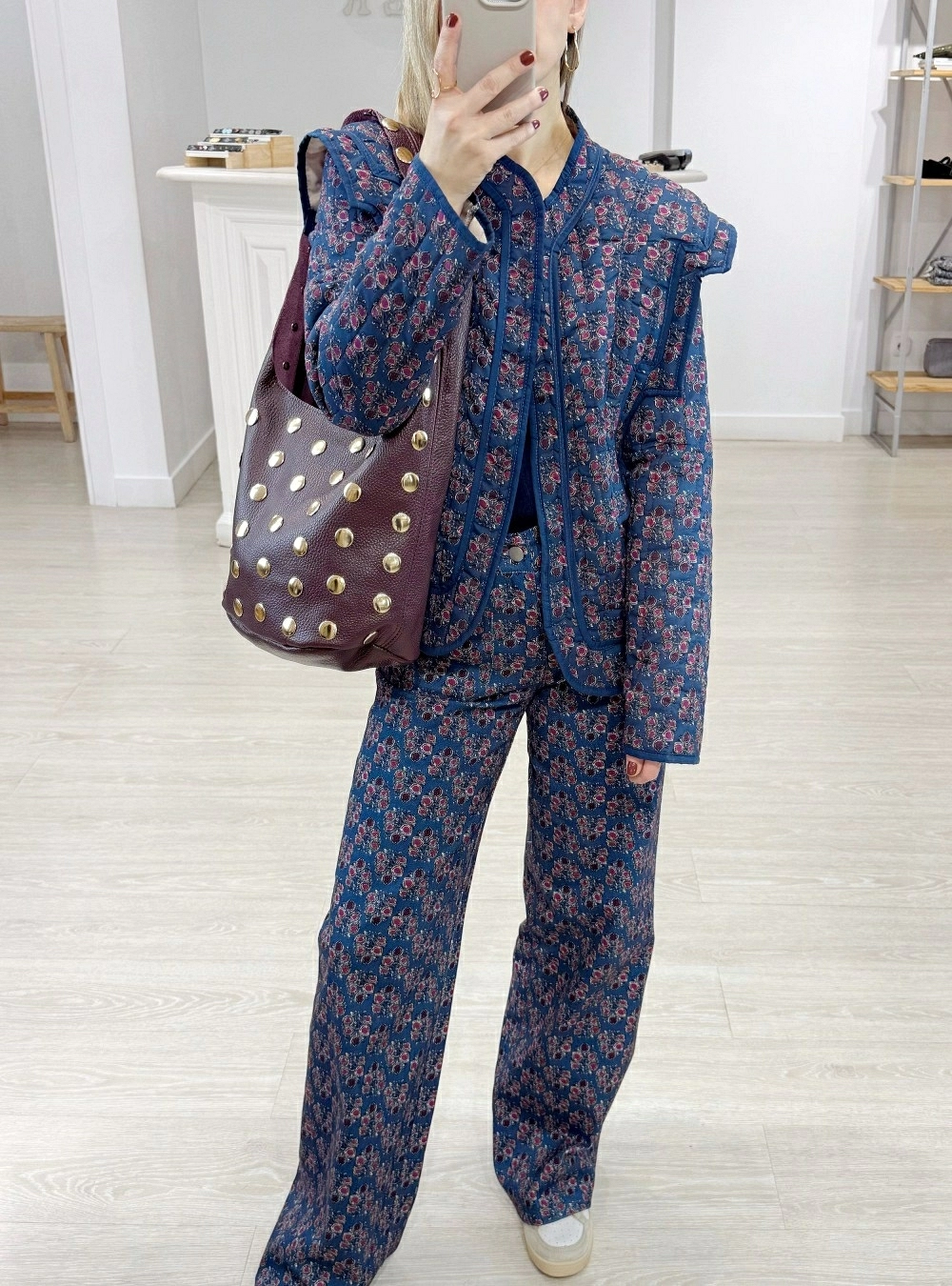 Bolso piel tachas frontal