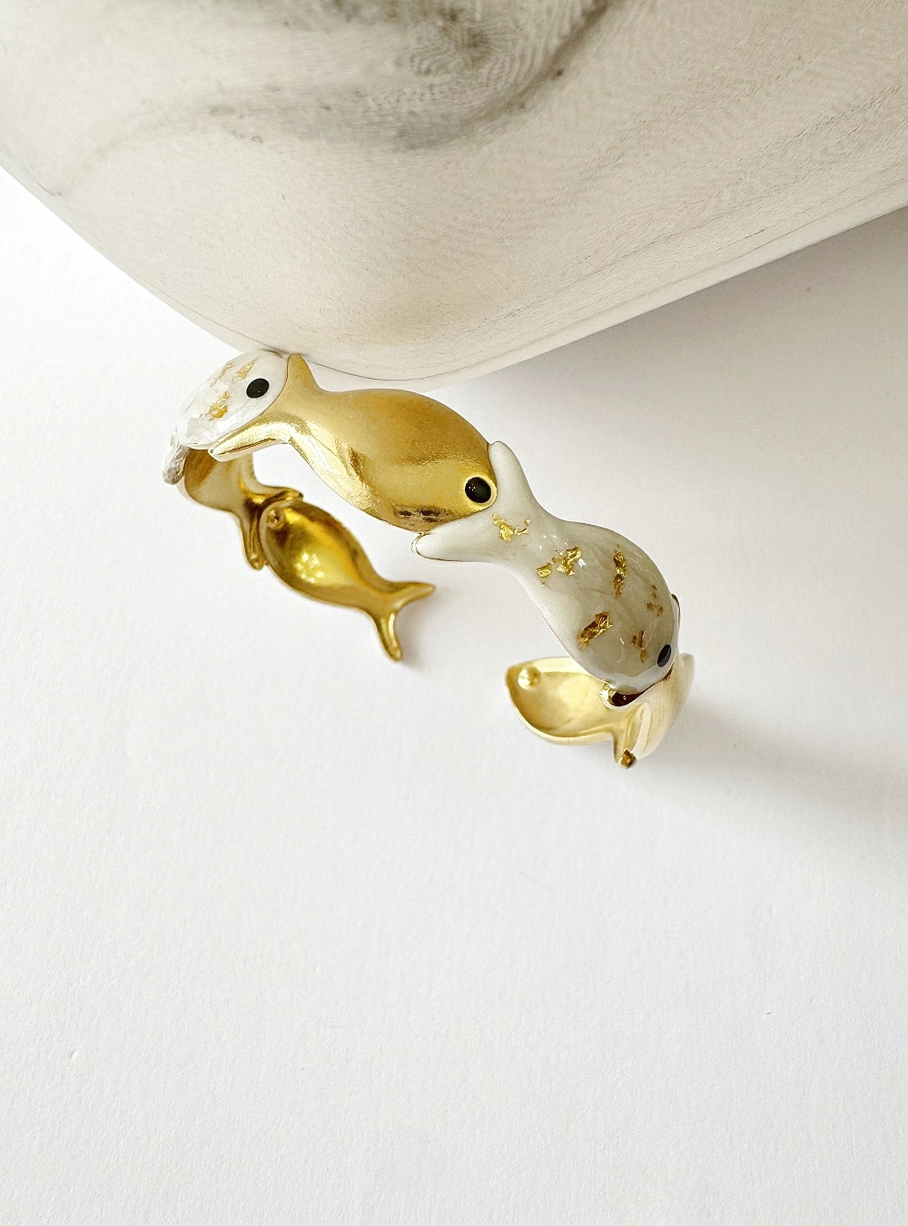 Brazalete fila de peces