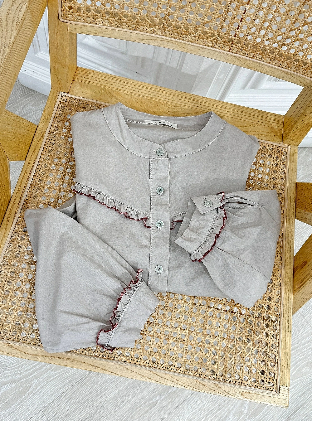 Camisa bordes remallados color
