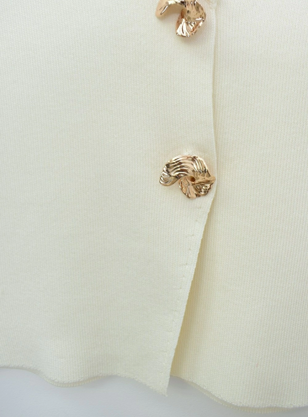 Chaleco botones joya