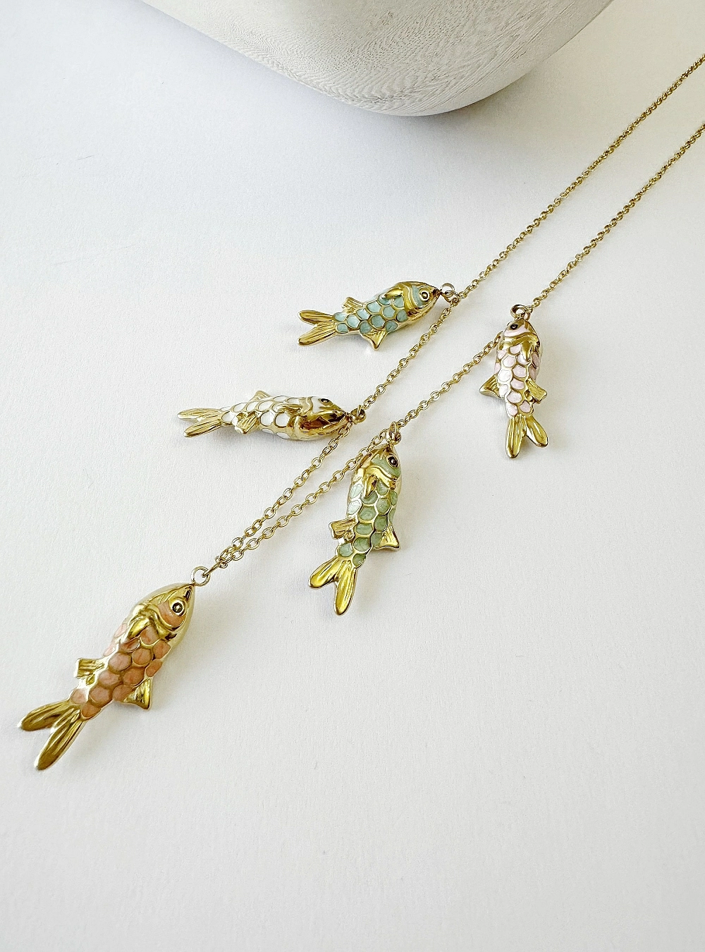 Collar cinco peces