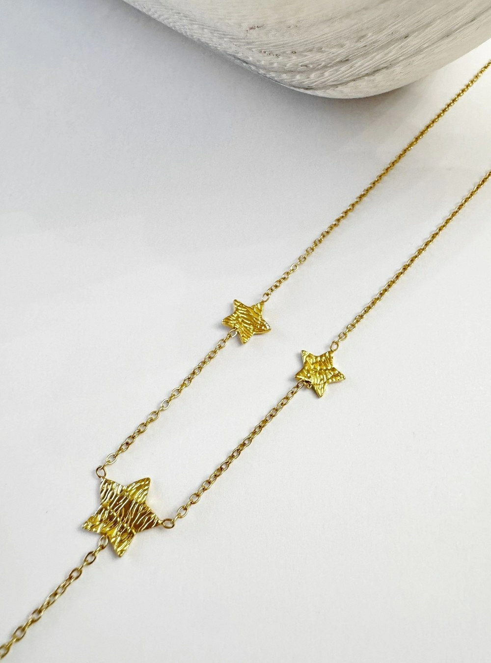 Collar estrellas rugosas