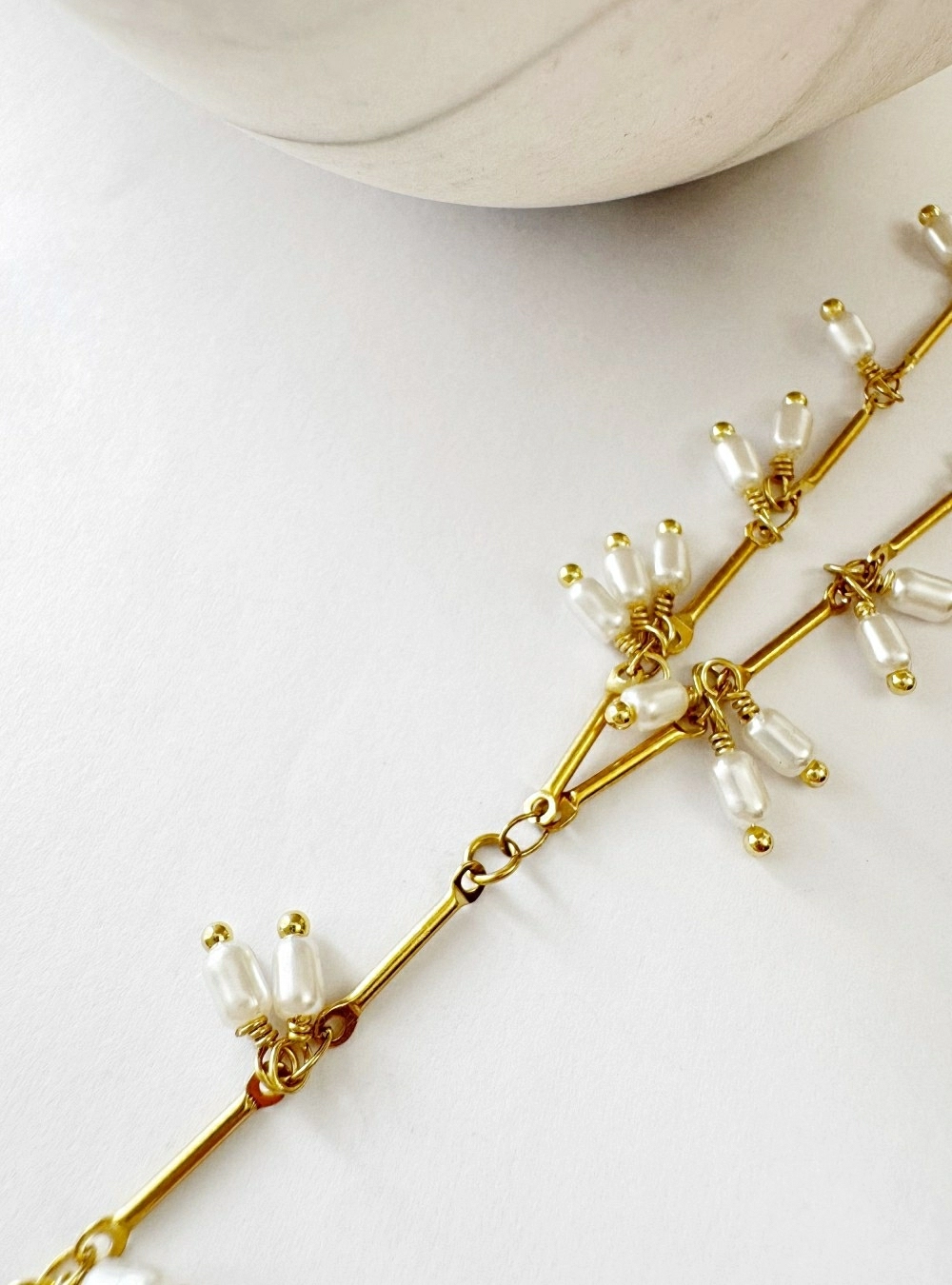Collar perlas y barras