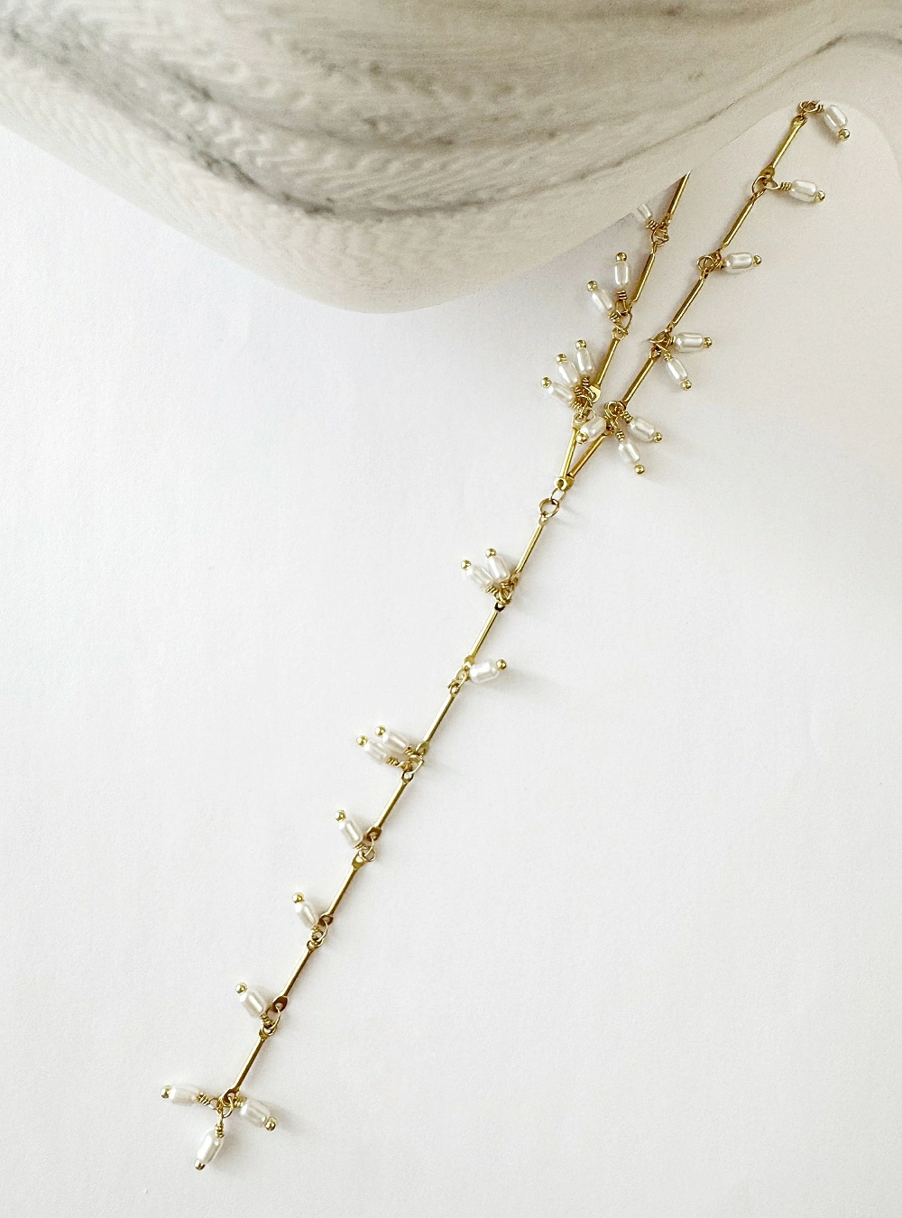 Collar perlas y barras