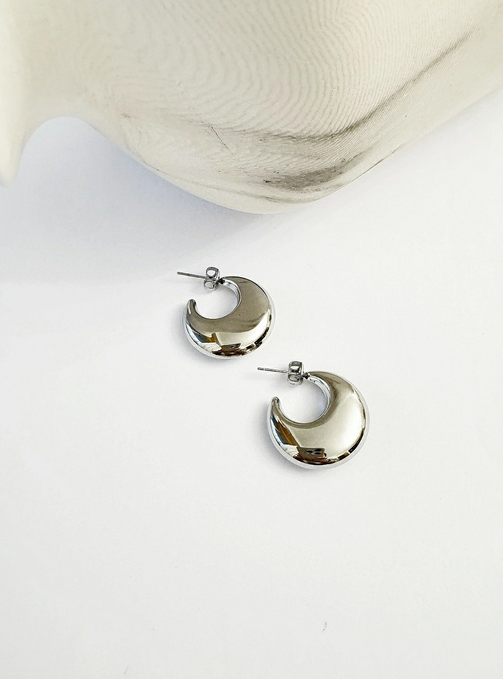 Pendientes acero media luna