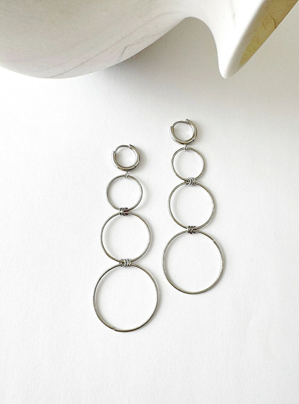 Pendientes cadena cuatro aros