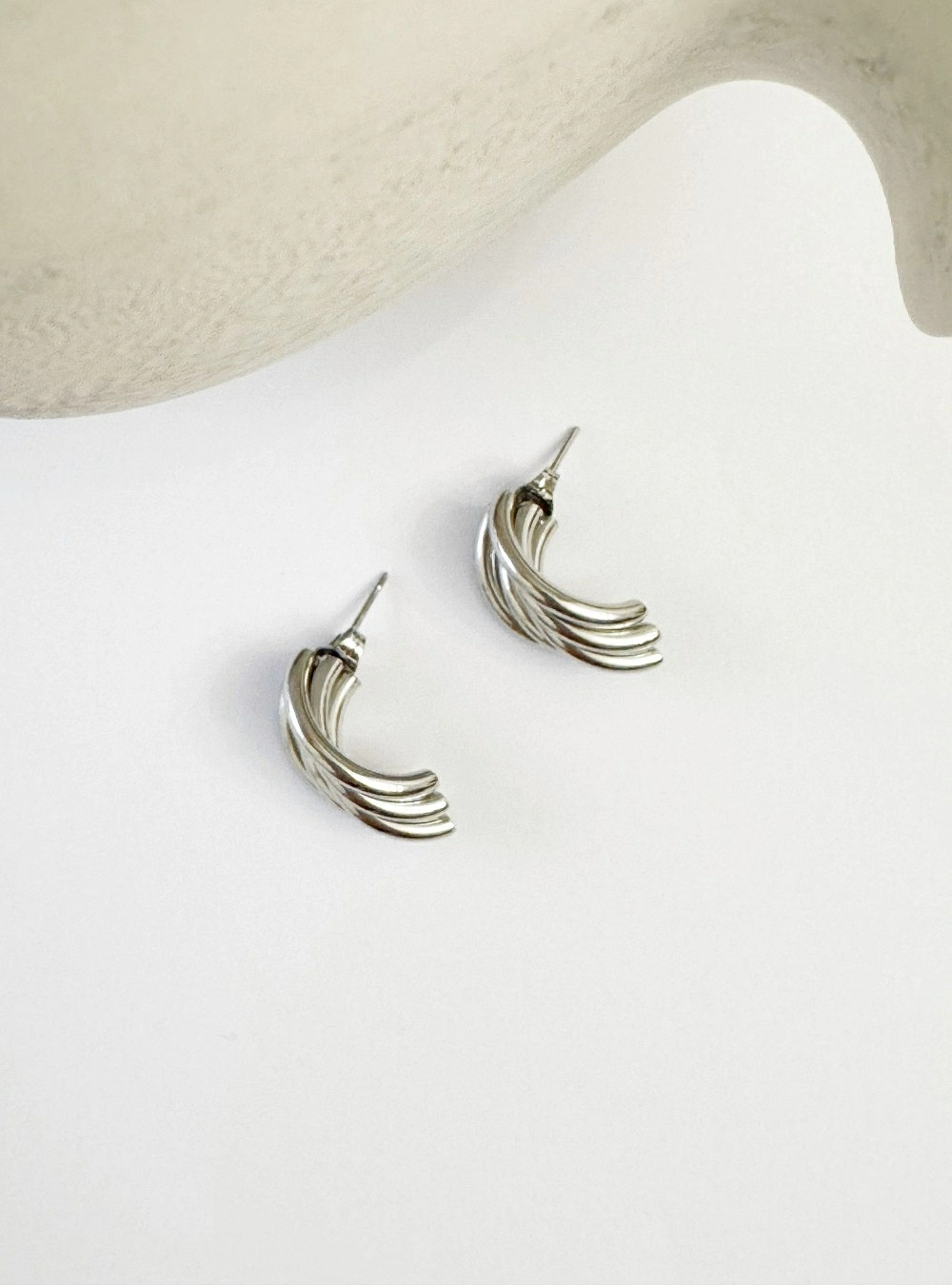 Pendientes cinco arcos