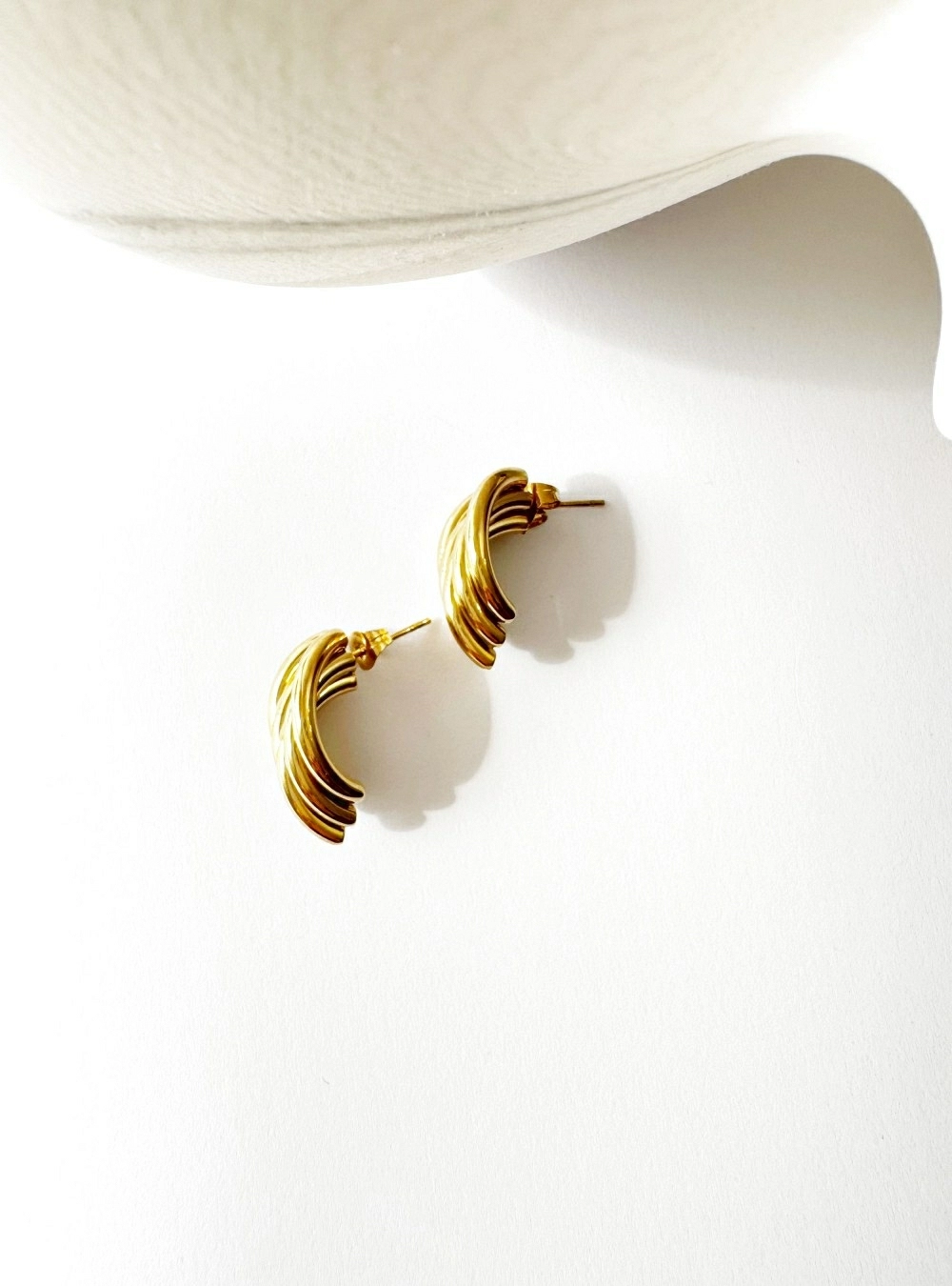 Pendientes cinco arcos