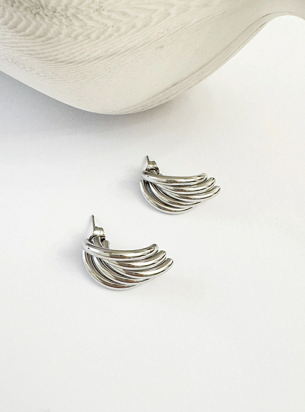 Pendientes cinco arcos