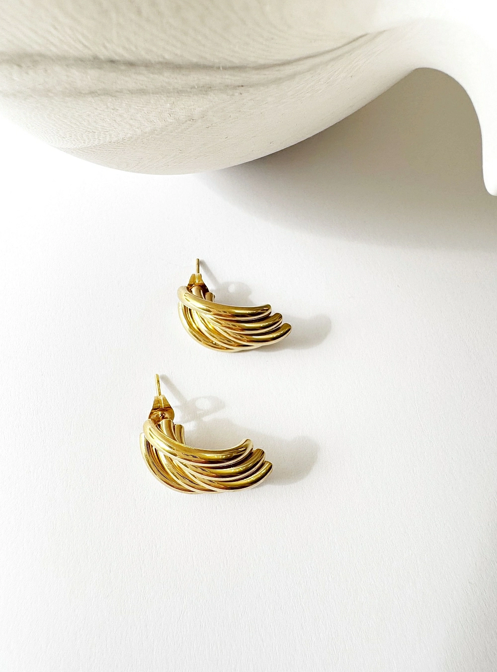 Pendientes cinco arcos