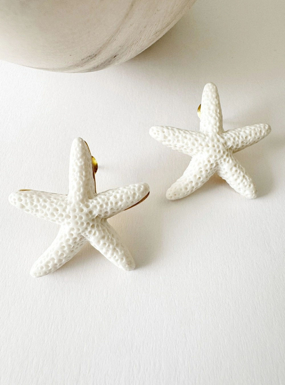 Pendientes estrella de mar de coral