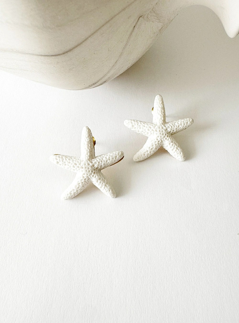 Pendientes estrella de mar de coral