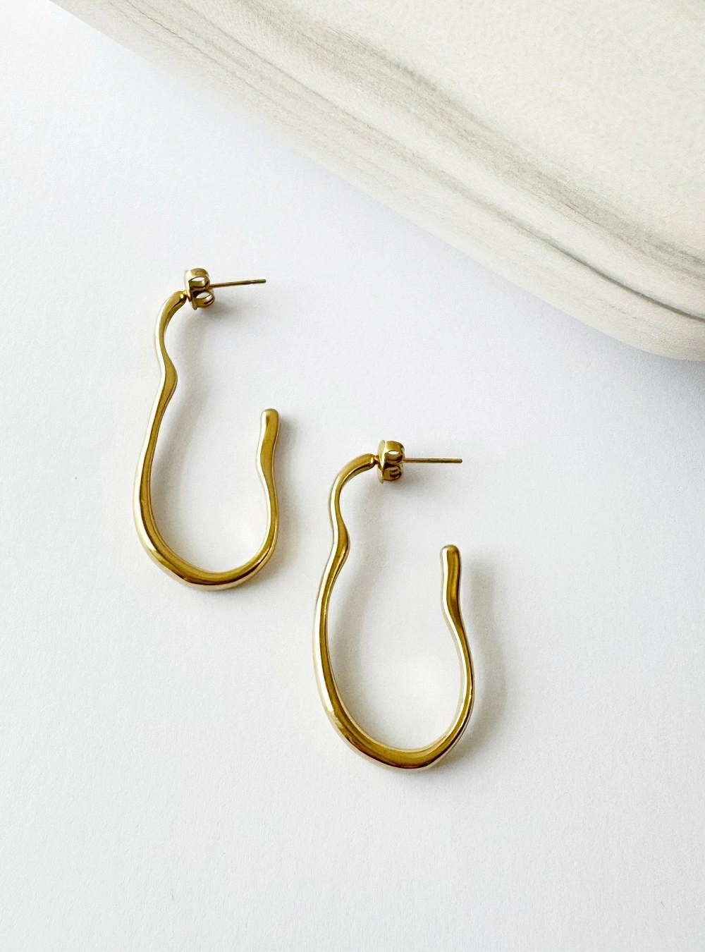 Pendientes forma de oreja