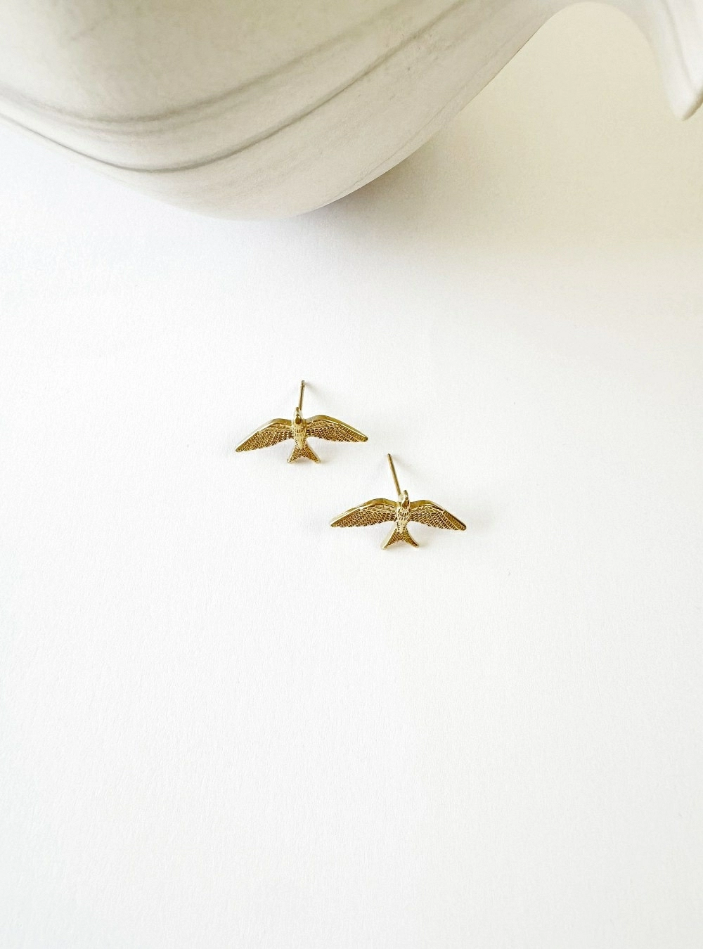 Pendientes golondrinas