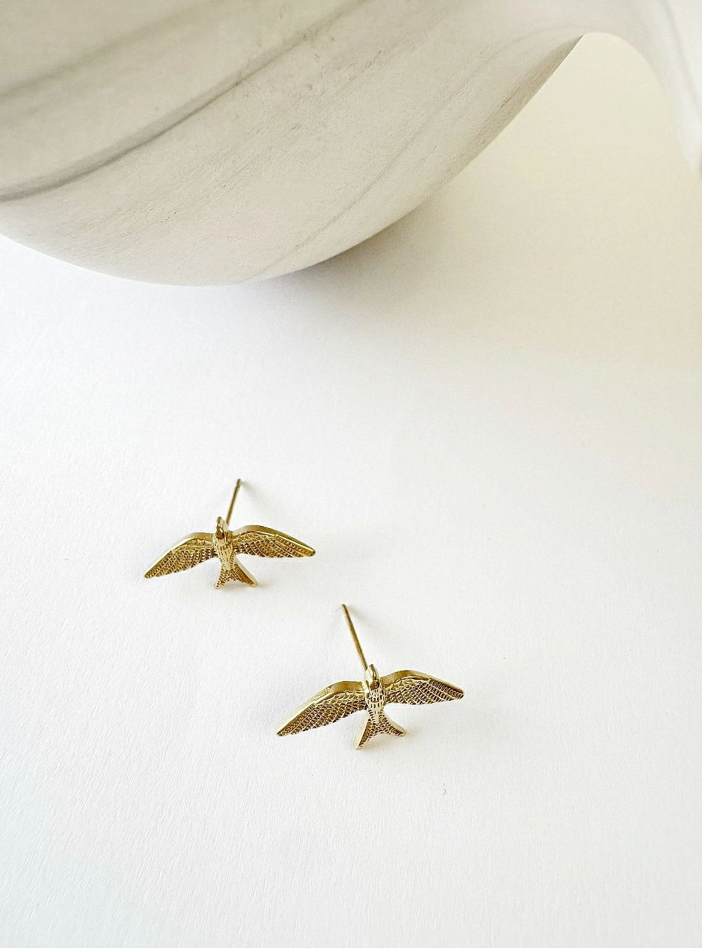 Pendientes golondrinas