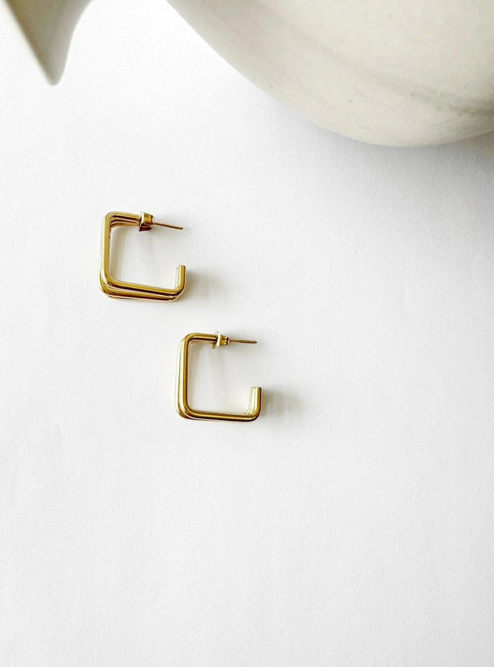Pendientes three square