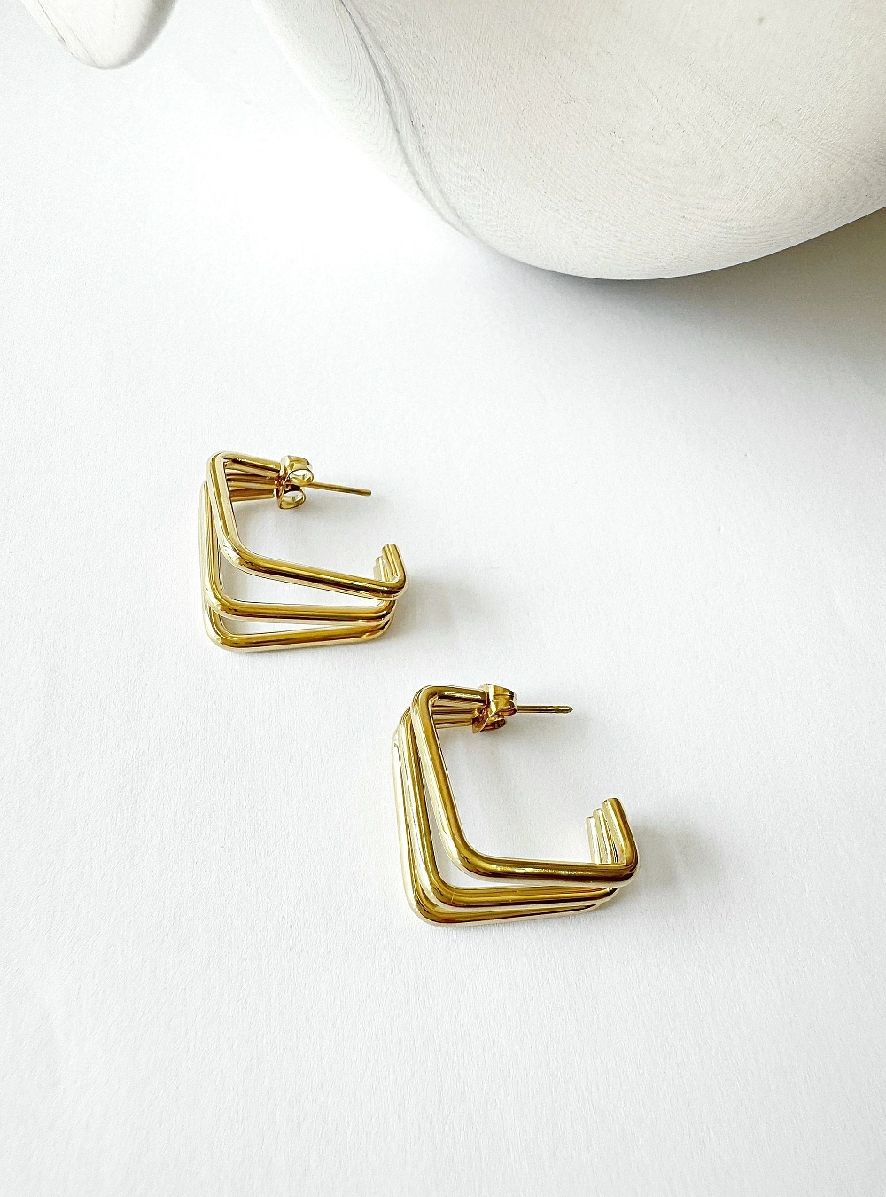 Pendientes three square