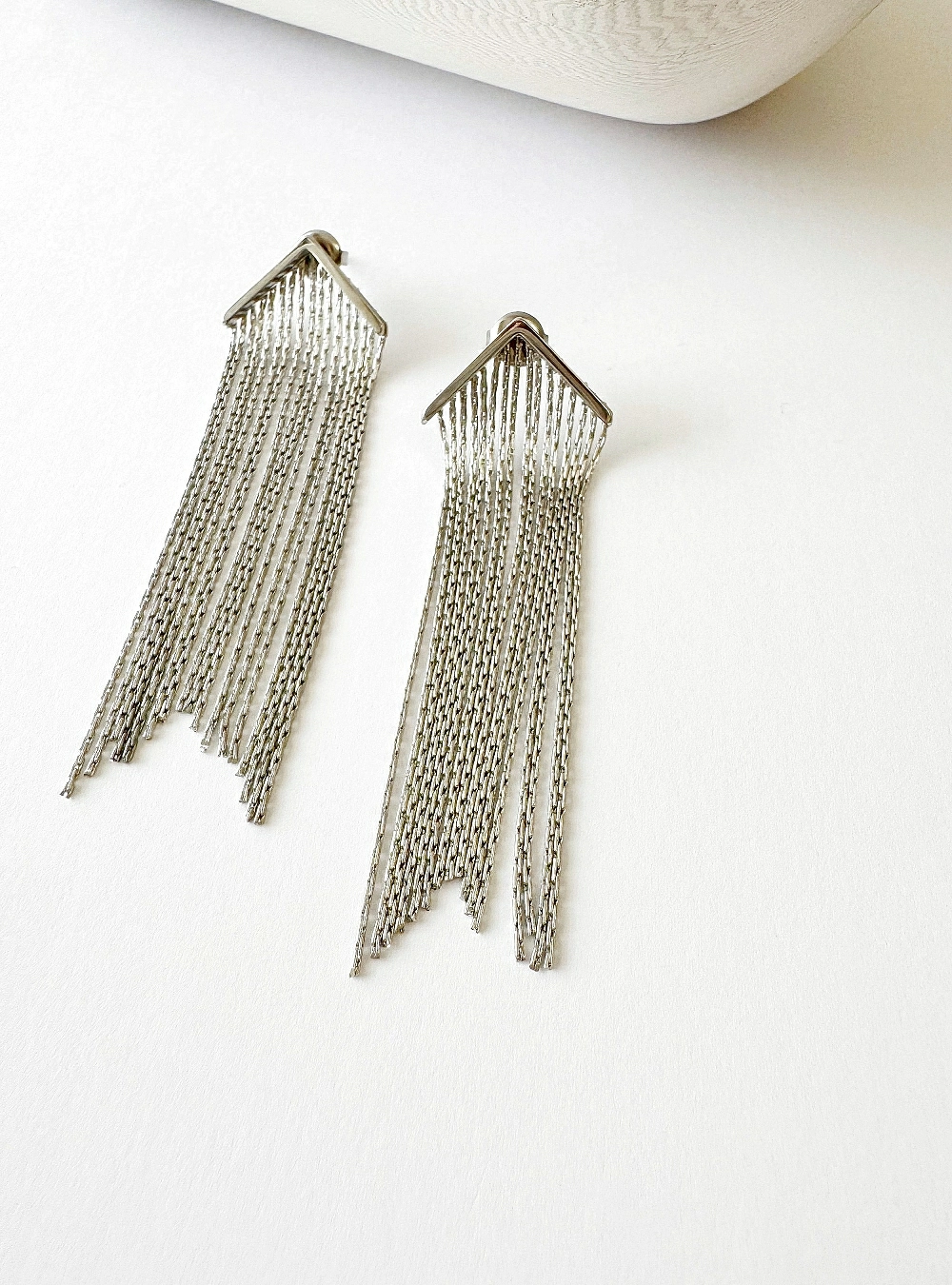 Pendientes triangulo de cadenas