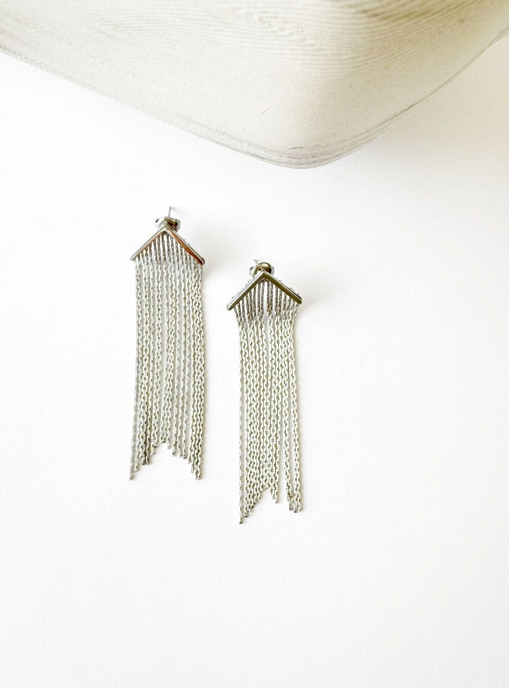 Pendientes triangulo de cadenas