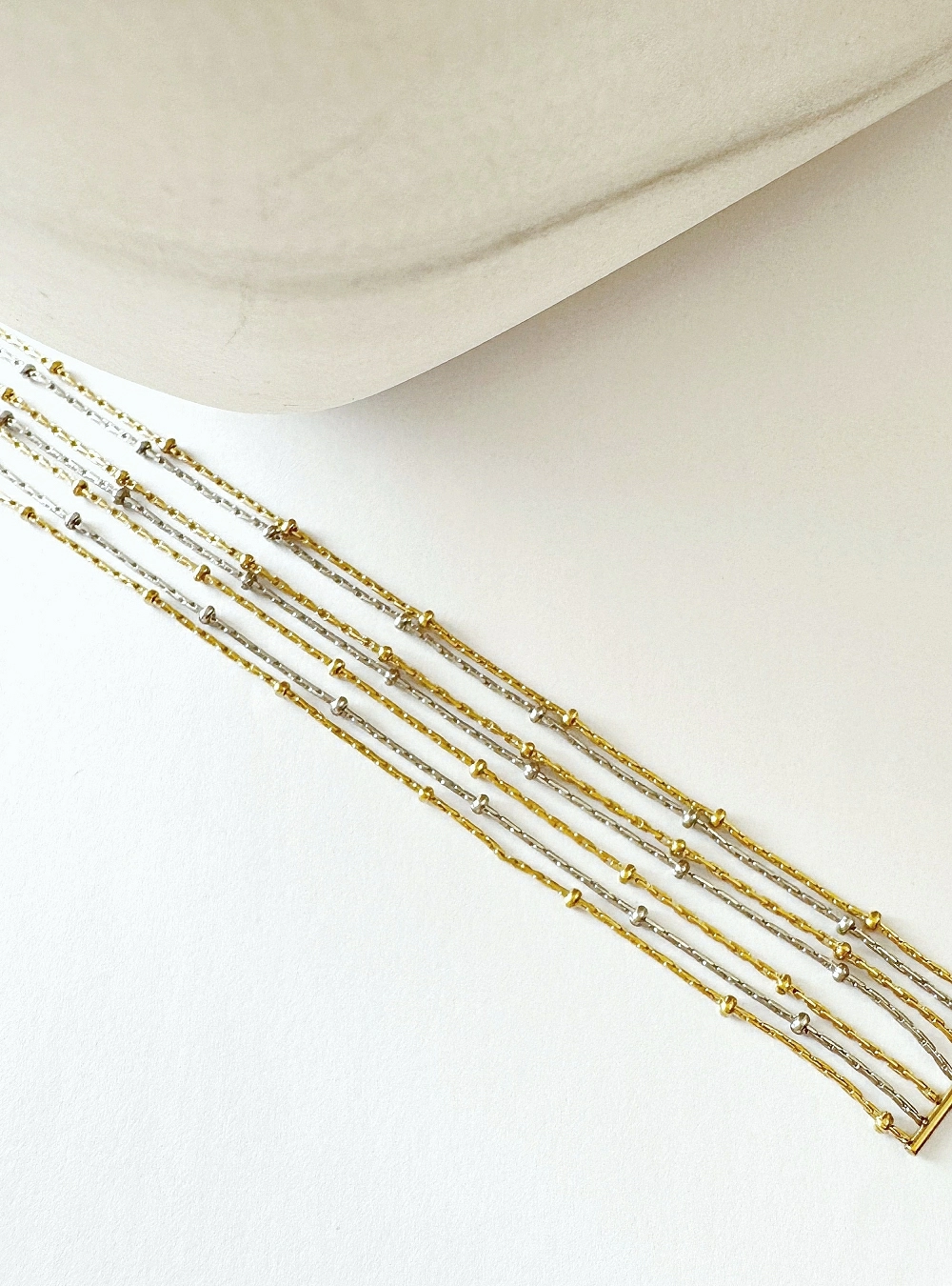 Pulsera cadenas silver and gold