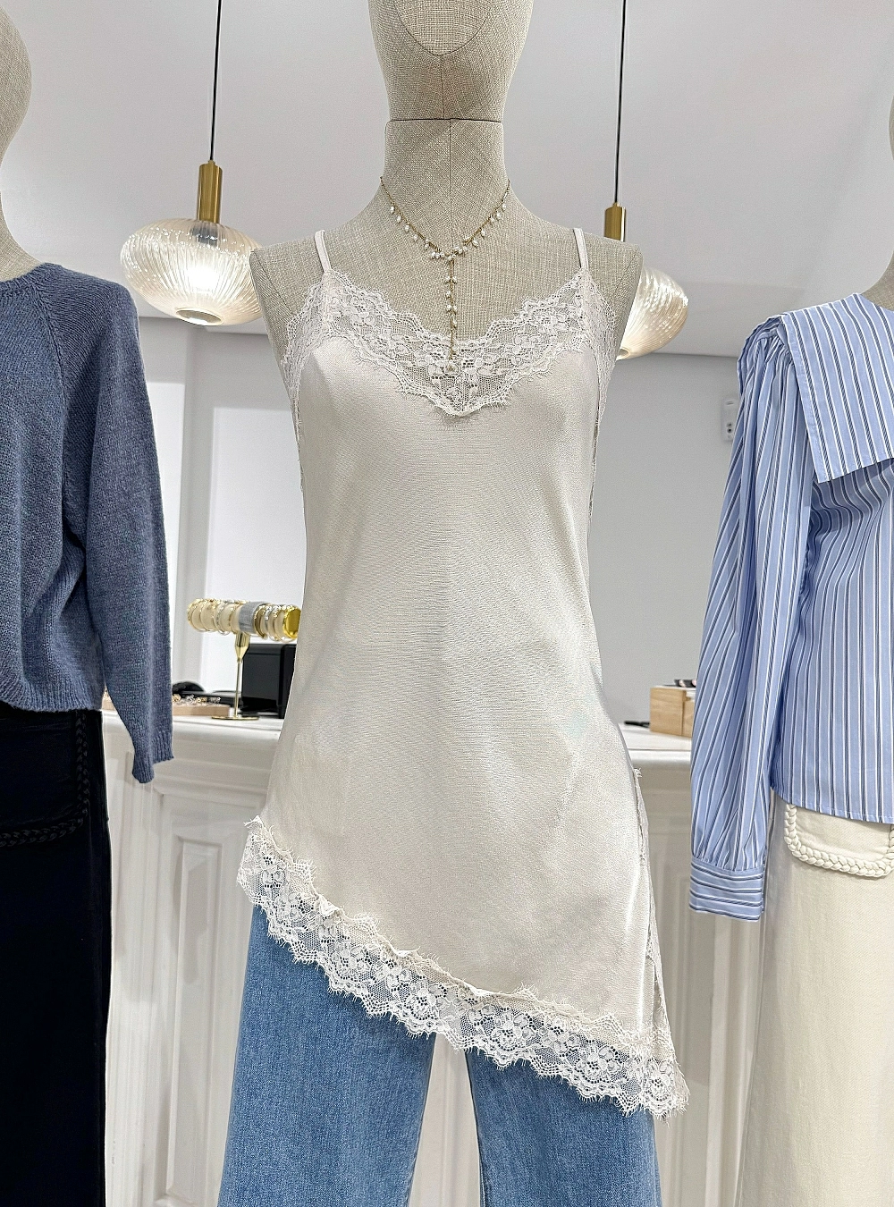 Top asimetrico puntillas