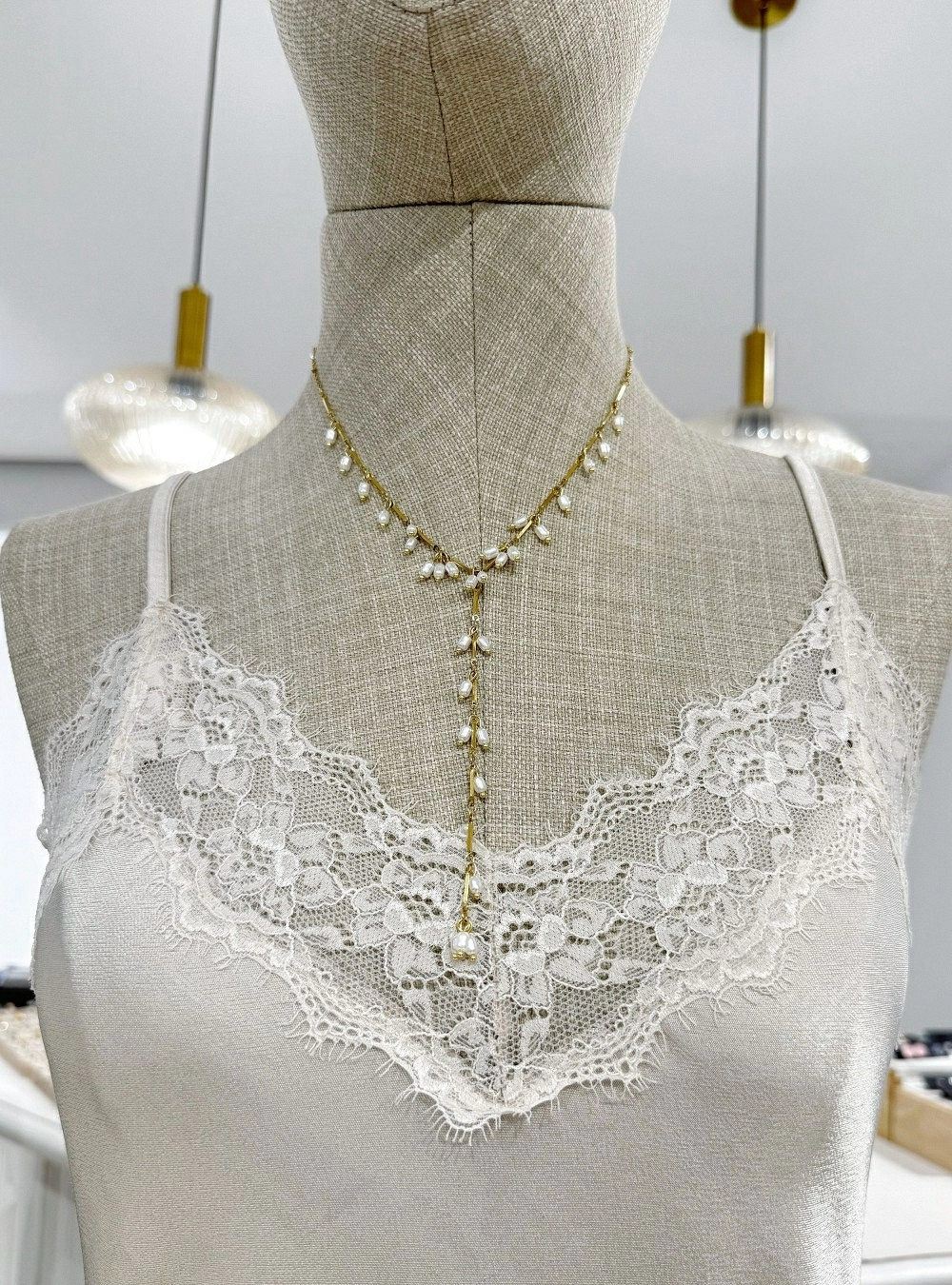 Top asimetrico puntillas