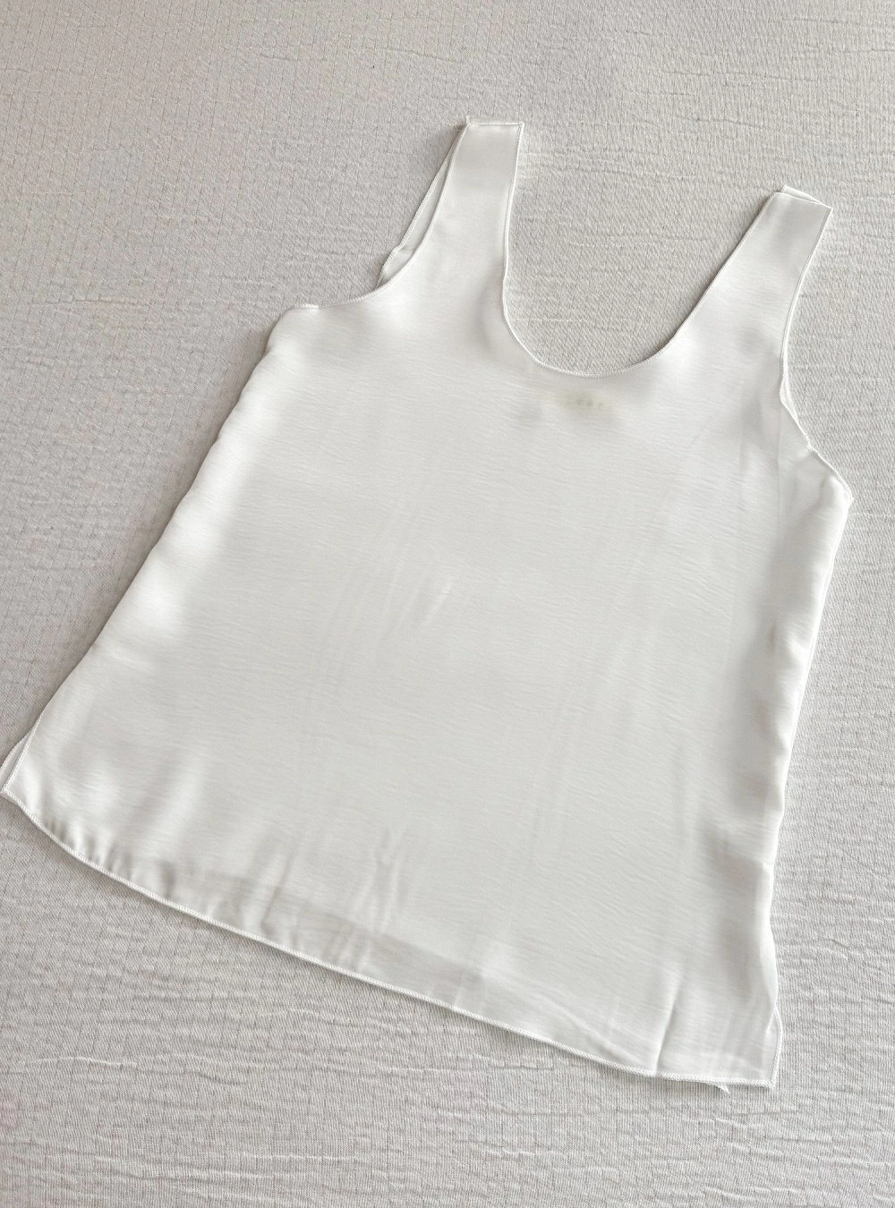 Top lencero borde remallado