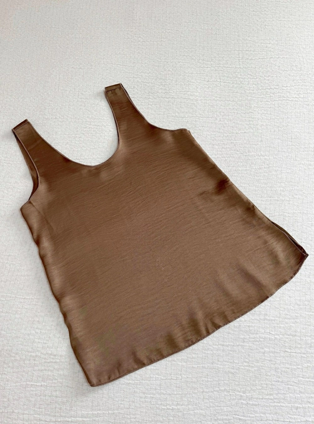 Top lencero borde remallado