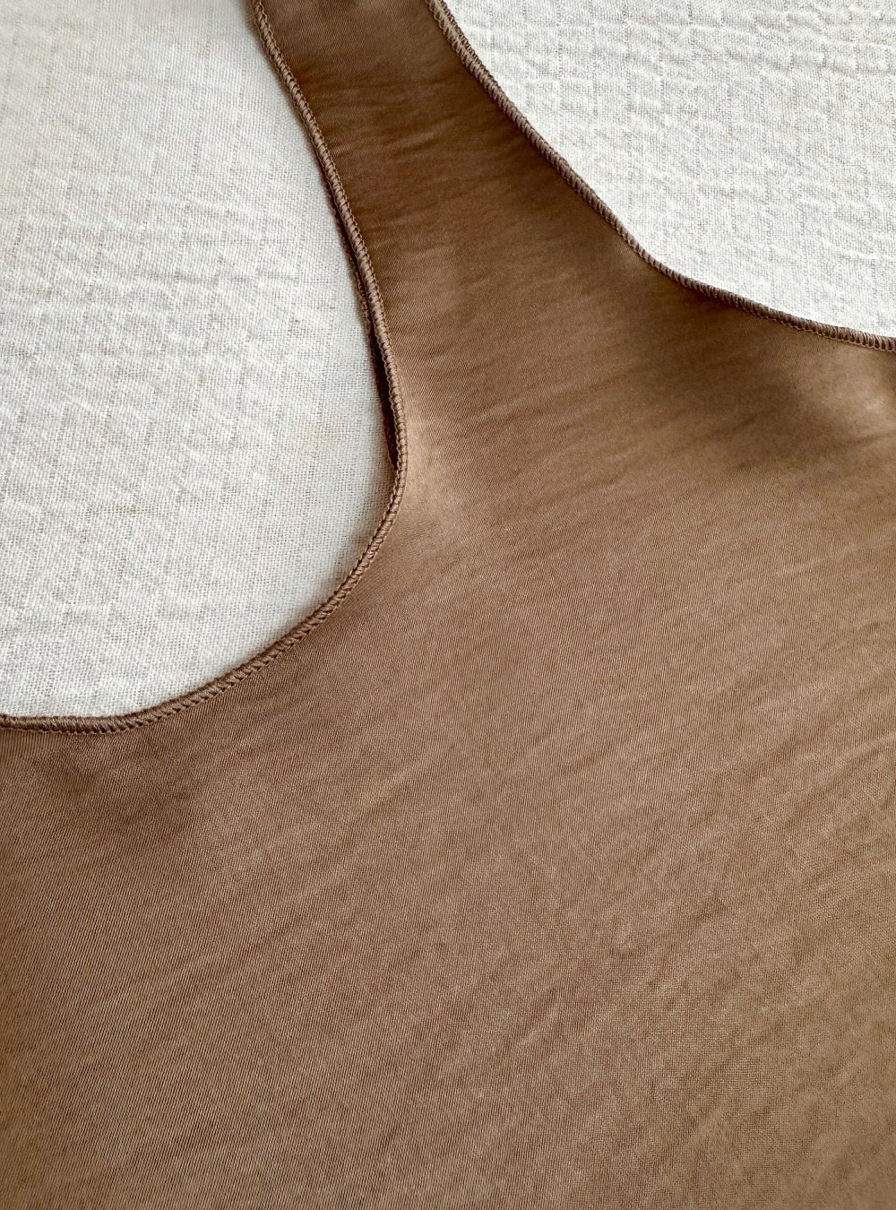 Top lencero borde remallado